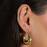 sterling silver 925 women wearing earrings teardrop like hoop jewelry made in italy gold plated